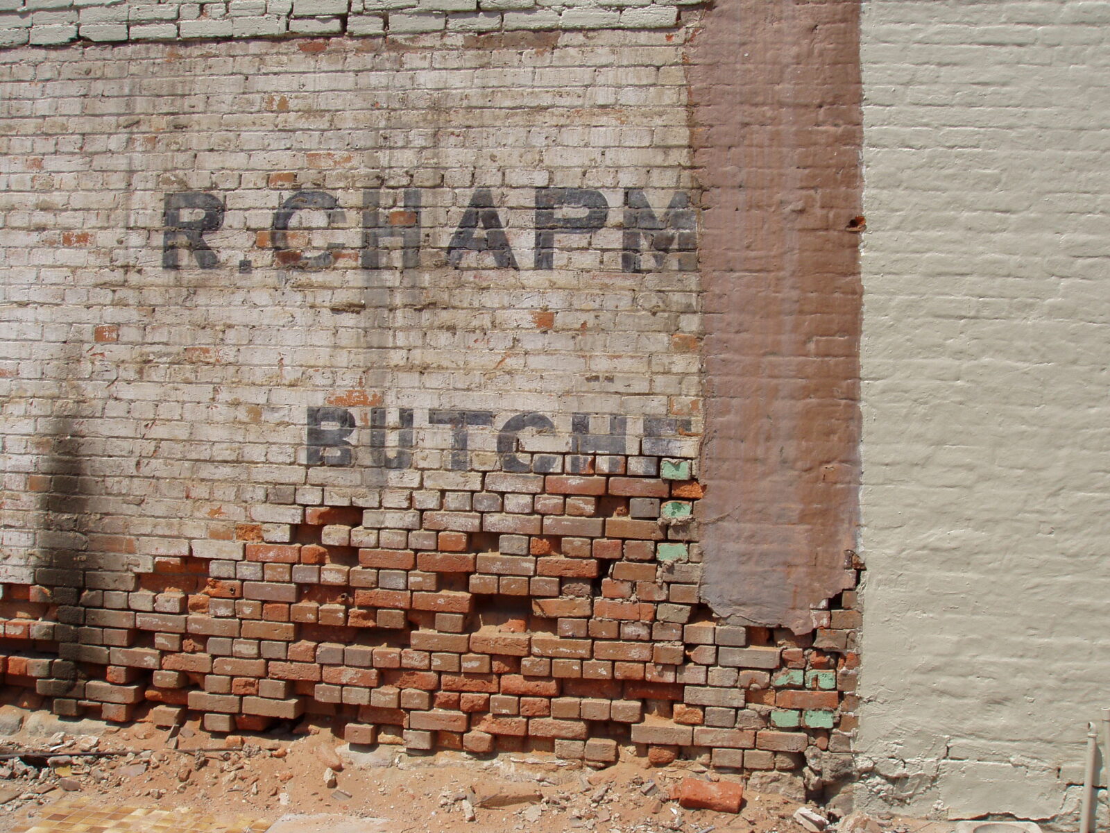Side wall of the Bakery showing R. Chapman, Butcher of Morpeth